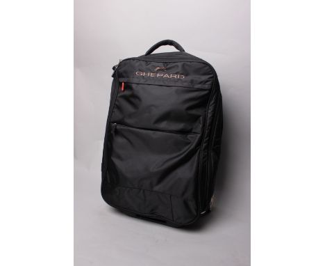 A Ghepard black roller suitcase.