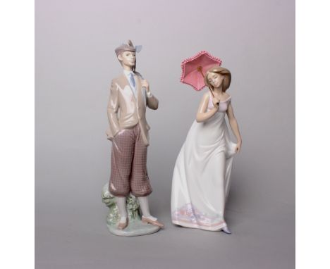 Lladro. - a figure of a gentleman golfer, No.31, 29cm high; together with a lady carrying a ceramic parasol, marked 'Collecto