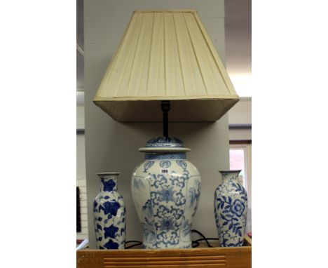 A collection of blue and white and Oriental pottery to include a large baluster shaped lamp and an Oriental bowl on stand and
