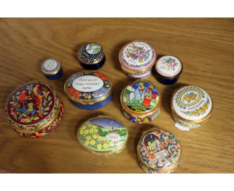 A Halcyon Days enamel box with exotic birds, together with seven other Halcyon Days enamel boxes (8)