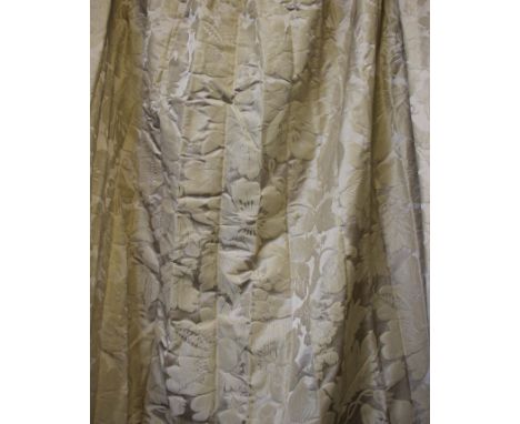 A pair of cream floral lined curtains, drop approx. 300cm.