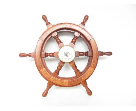Barometer in the form of a ships wheel 