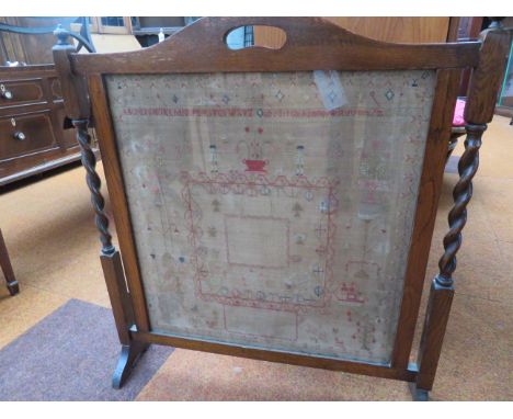 Large early Victorian sampler inset into a fire screen 