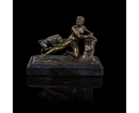  A NORTH EUROPEAN BRONZE FIGURE GROUP OF MILO OF CROTON 18TH CENTURY dark brown patina, mounted on a black marble base Figure