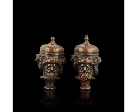  PAIR OF ITALIAN BRONZE FINIALS, AFTER LORENZO GHIBERTI 19TH CENTURY dark brown patina, modelled with three faces of a man re