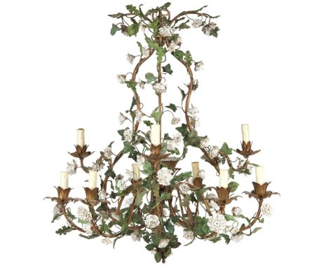  A CONTINENTAL TOLE AND PORCELAIN MOUNTED TEN LIGHT CHANDELIER EARLY 20TH CENTURY the open bird-cage frame mounted with tole 