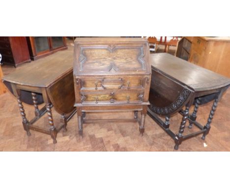 Two early 20th century oak barley-twist gate-leg tables and a bureau on turned legs. Condition reports are not available for 