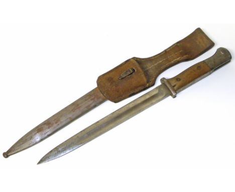 German Mauser bayonet complete with scabbard and frog. Condition reports are not available for Interiors Sales.