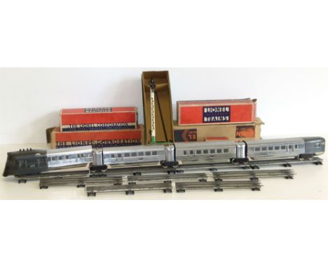 Lionel electric streamline carriage train with original boxes, also Hornby signal arm and various 'O' gauge track Condition r