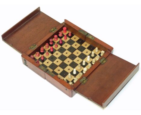 Victorian mahogany cased travelling chess set with bone playing pieces. Condition reports are not available for Interiors Sal