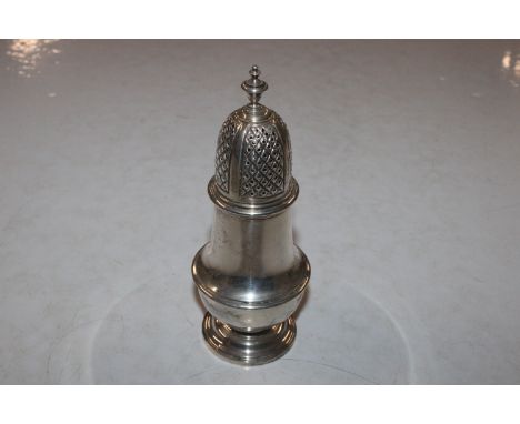 A modern silver sugar shaker