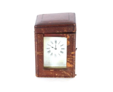 A brass cased striking carriage clock complete with leather travelling case, 17cm high AF