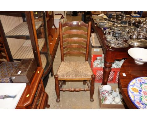 A set of five rush seated and ladder back chairs 