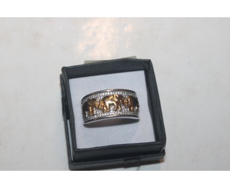 A Tova Sterling silver ring with gold elephant decoration, rings size U/V, approx. 9gms 