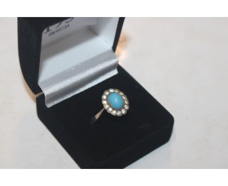 A 925 silver gilt and turquoise set ring