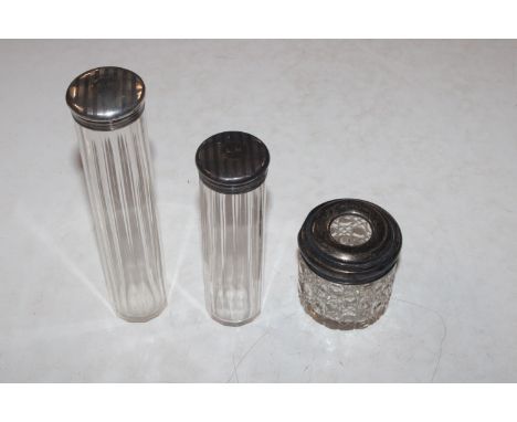 Two silver mounted hat pin jars and a silver mounted cut glass hair tidy 