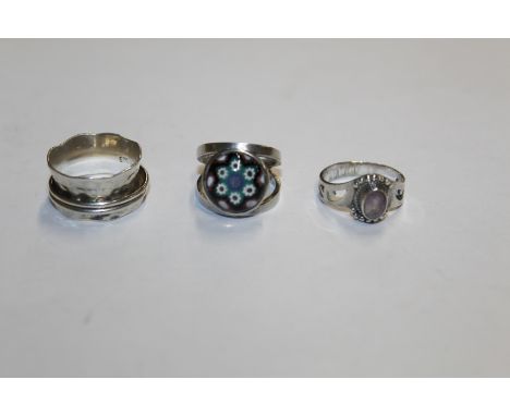 A Birmingham silver Hallmarked ring; a 925 spinner ring; and another 925 ring 