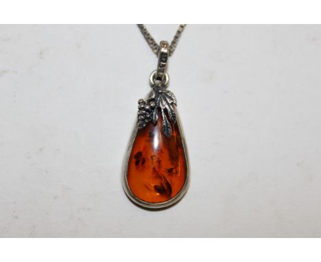 An Art Nouveau design Sterling silver mounted amber necklace 