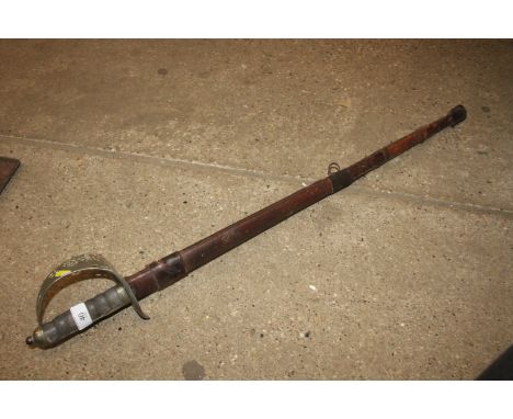 An 1897 pattern GRV Infantry officers sword in brown leather field scabbard 