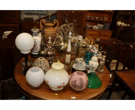 A large quantity of various table lamps and shades etc. to include a brass Corinthian column table lamp, an alabaster table l