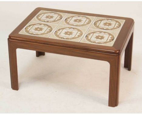 A 1970s G-Plan teak and tile top inset small coffee table, having rounded corners, with pinched detail, h.40cm, length 71cm, 