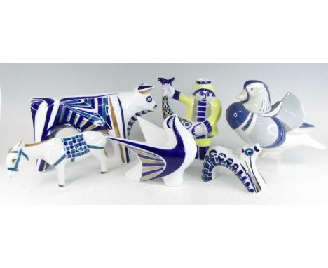 A collection of four stylised Spanish figures by The Sargadelos Pottery, the largest of a standing bull, length 30cm; togethe