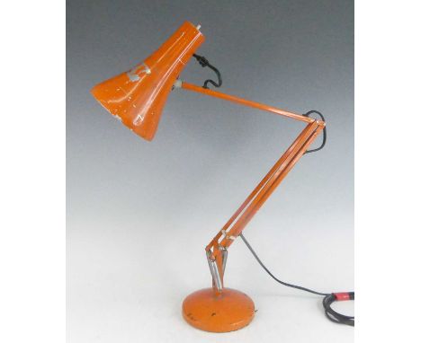 Herbert Terry - a mid-20th century orange painted anglepoise lamp, having typical adjustable rotating action, with moveable s