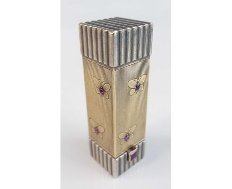 A French Art Deco white and gilt metal lipstick holder, the removable cover decorated with butterflies, having ruby stud deta