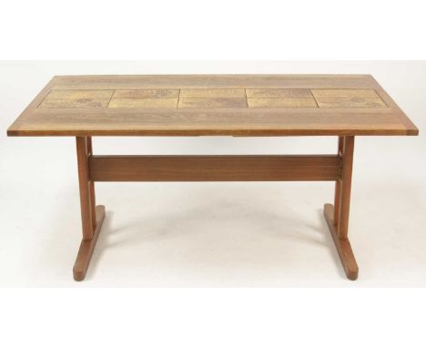 A 1970s Danish teak and tile top inset dining table, of plain rectangular form, with twin rows of central inset tiles and opp