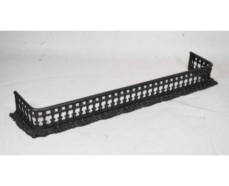 Cast iron fender with pierced decoration, 130cm x 26cm deep