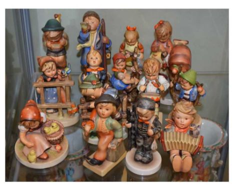 Collection of fourteen Hummel (Goebel) figures, 13cm high and smaller