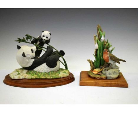 Franklin Mint ceramic panda group 'Pride and Joy' and an Akita porcelain Robin 20/252, both mounted on wooden bases, 26cm hig