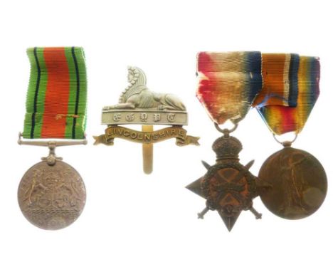 First World War medal pair awarded to J. 35033 J. Adams, DRD. R.N (Royal Navy), together with a Second World War Defence Meda