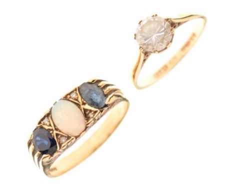 Two 9ct gold stone set dress rings, one set opal and two sapphires, size T, the other set a single CZ, size O, 5.1g gross app