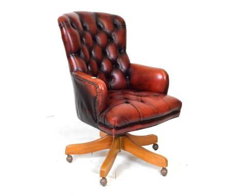 Button-back office swivel chair, with red leatherette upholstery, 60cm (seats widest point) x 96cm high