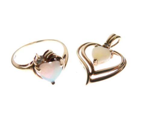 Yellow metal opal and diamond set ring, stamped 'P14k', size J½, and a yellow metal heart shaped pendant set opal and diamond