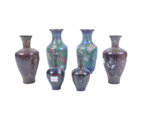 A collection of Chinese 20th century brass and enamel decorated vases. To include a pair of blue glass champleve enamel vases