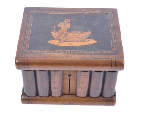 An early 20th century olivewood inlaid puzzle box. The small casket box with inlaid decoration to the top depicting a rowing 