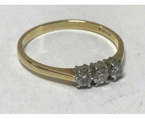 Three stone diamond ring