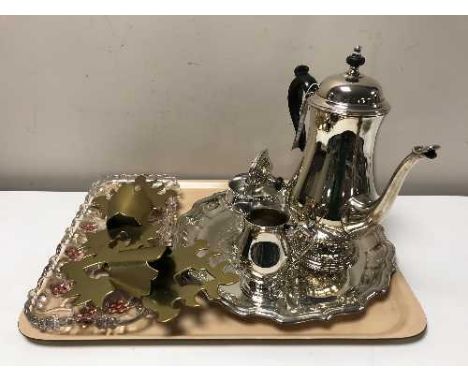 A three piece Oneida plated tea service on tray together with a glass trinket tray and two brass sconces 