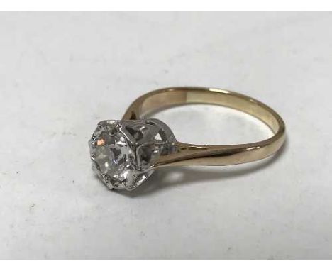 A 14 ct gold solitaire diamond ring, approximately 0.6 carat. 