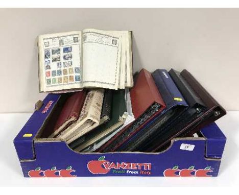 A box of nine assorted albums and folders containing stamps of the world and first day covers 