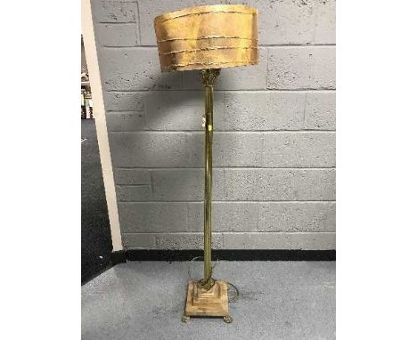 A heavy brass Corinthian column standard lamp with shade 