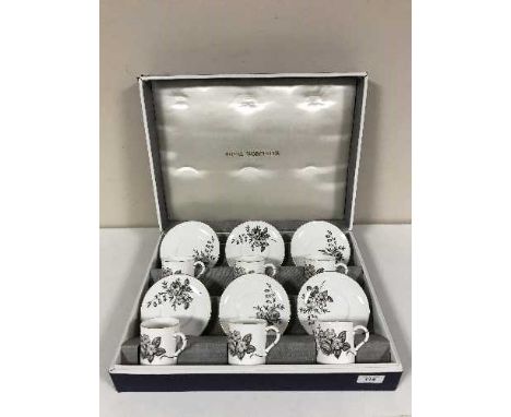 A boxed Royal Worcester twelve piece coffee set