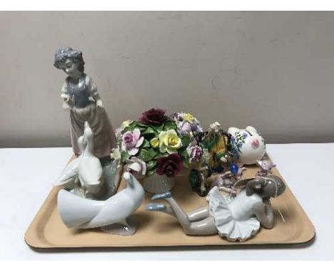 A tray of two Nao figures, continental figure - Girl with ducks, three china flower posies, two Japanese pottery figures, mon