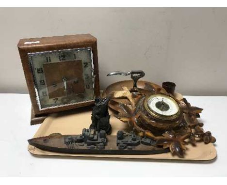 A tray of walnut clock, German barometer, wooden nut bowl with nut cracker, model of a destroyer etc 