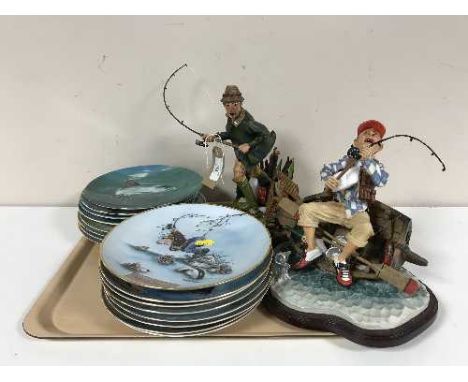 A tray of twelve Danbury Mint collectable fishing plates by Gary Patterson together with two fishing figures on wooden bases 