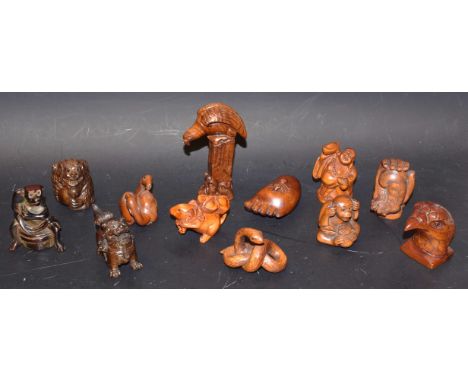 A carved hardwood netsuke, rat; others, snake, camels, dog of Fo, monket, hand, etc