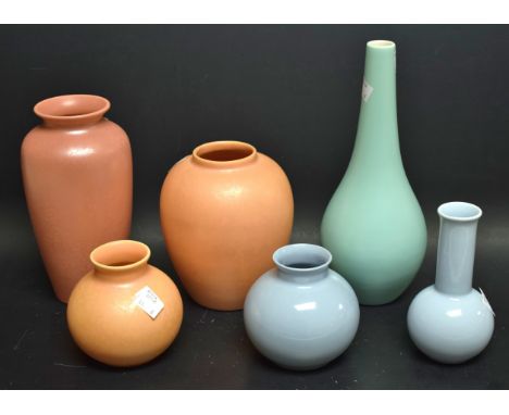 A Poole ovoid vase glazed throughout in salmon pink; others similar, bottle vase in aqua green glaze, etc (6)