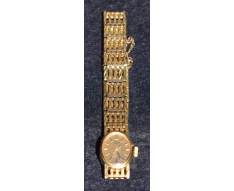 A Lady's Rotary 9ct gold cased bracelet watch, oval gilt dial, Roman numerals, manual movement, integral 9ct gold gate bracel